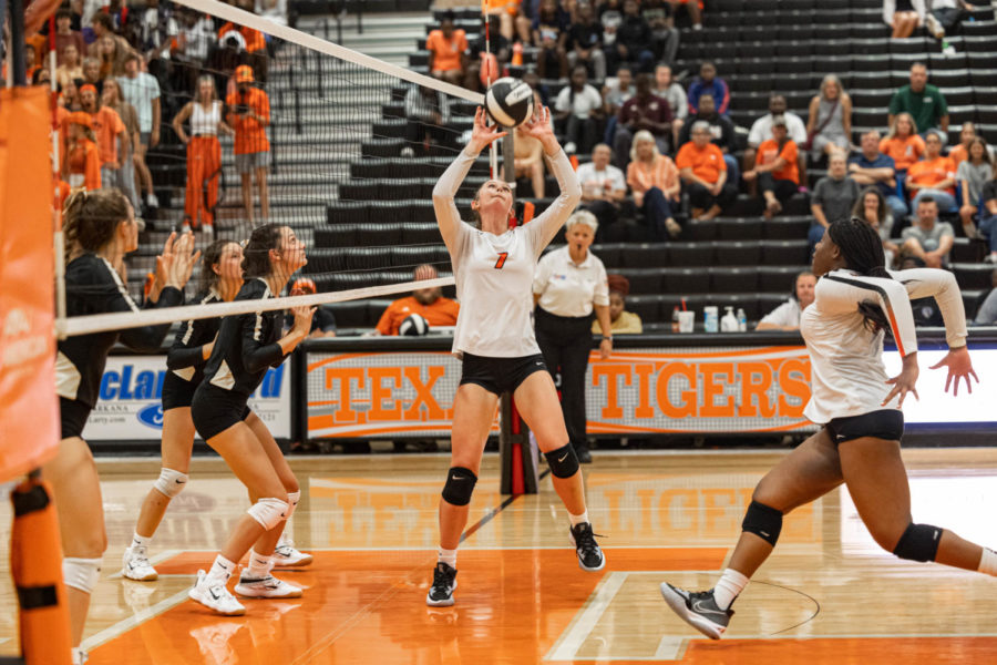 Senior Bella Cherry sets a ball in match against Pleasant Grove Aug 23, 2022. The Lady Tigers defeated PG in Cherrys final Texas High rivalry match 3-1.