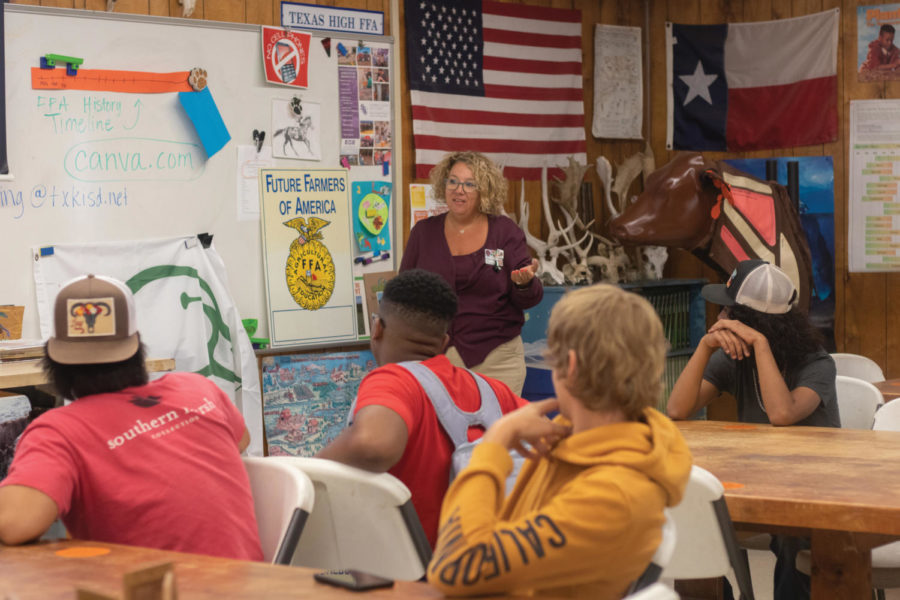 Students+listen+to+agriculture+teacher+Kim+Spaulding+as+she+explains+to+students+what+FFA+is+and+what+they+do.+