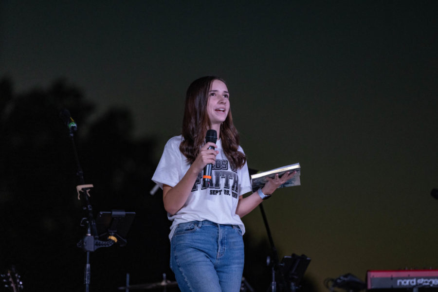 Senior Braylen Garren gives a message at the Fields of Faith event. Students from Texas High School spoke, volunteered and attended the annual event.