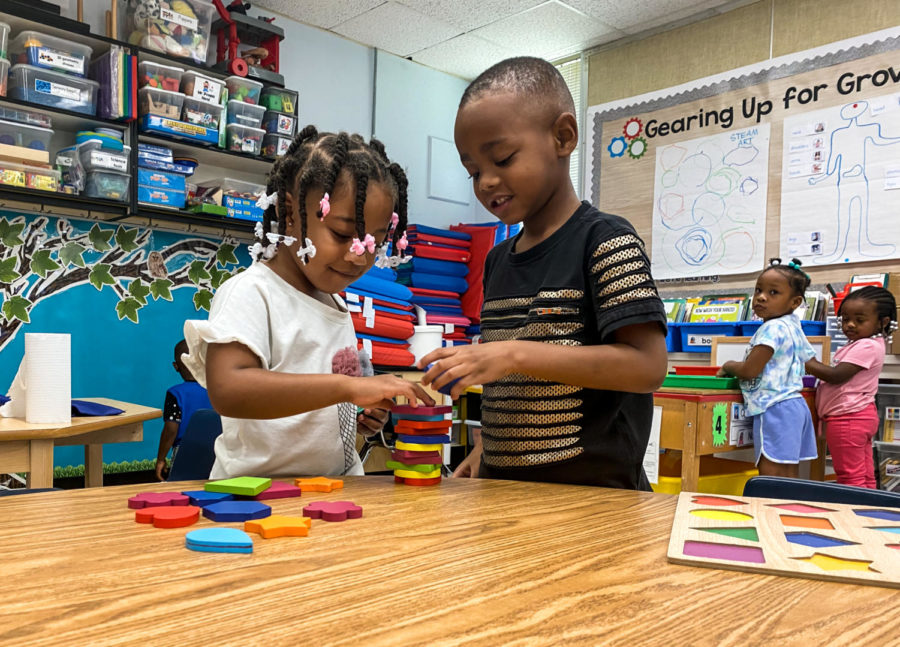 Children at Paul Laurence Dunbar Early Education Center play with shapes in class Wednesday, Sept. 14, 2022. The CDA program buses Texas High students off-campus to Dunbar to develop their skills and gain experience with children.