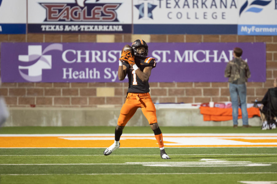 Junior Tamarcus Gray receives the ball in game against Marshall, Friday, Oct. 14, 2022. The Tigers defeated the Mavericks 42-35.