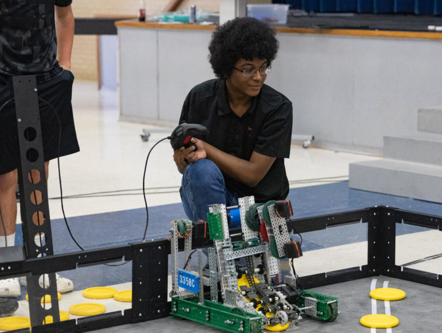 Sophomore Evan Wyshe hooks up his controller and prepares to compete in his first match of the season. Four teams attended the competition at Redwater this weekend.