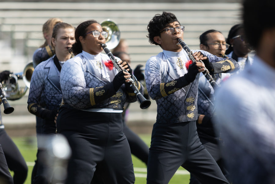 Junior Taybri Johnson marches with her clarinet at the UIL Area marching contest. The Texas High marching band competed in Mesquite, TX on Oct. 22.