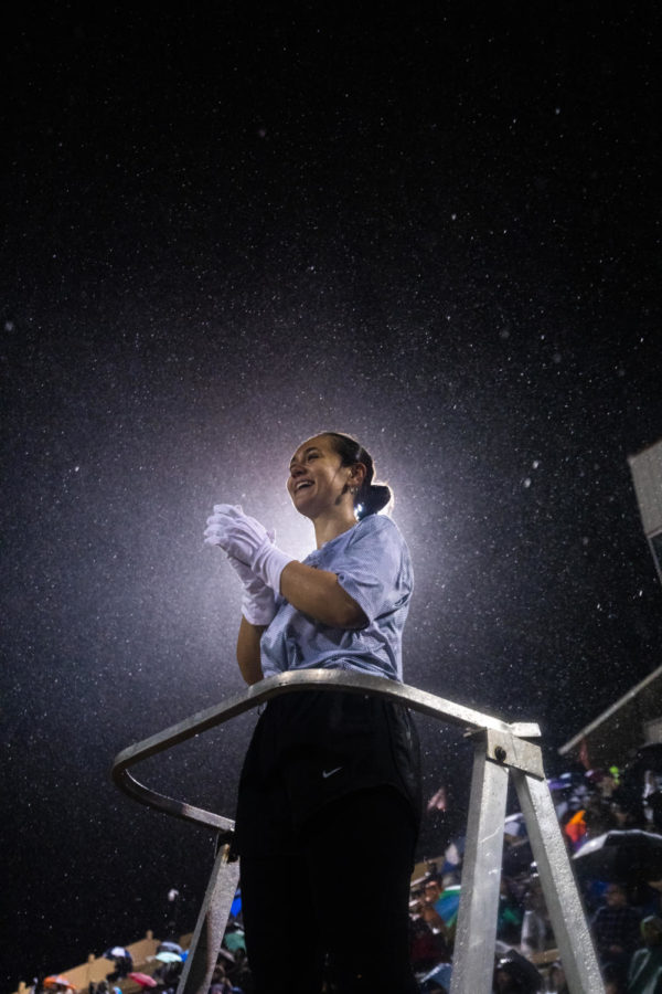 Texas High Drum Major Kaitlyn Colburn cheers after directing the band on its last 2022 halftime performance: Queen of the Night. The band members practiced every morning before school at 7 a.m. for their halftime show.