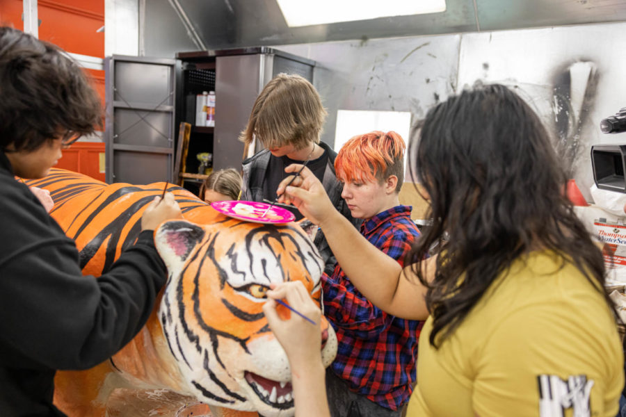 Lighthouse Leadership repaints the infamous marquee tiger, giving it new life once more. The tiger will stand on the Tiger Baseball scoreboard for all to see.