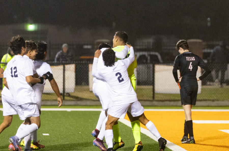 Senior Jackson Haltom walks off field as Paris celebrates their victory. The Tigers lost to Paris 3-4 Monday, Dec. 12, 2022.