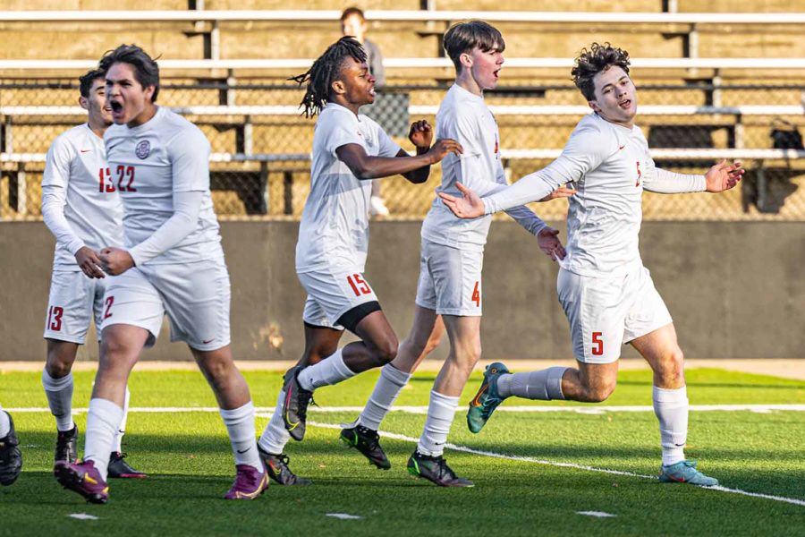 The Tigers celebrate a goal against cross town rival Pleasant Grove in a non-district matchup on Dec. 20, 2022. Early pre-season wins boosted morale for the upcoming district campaign.