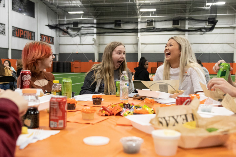 Red Lick eighth grader Cole McMillon and Senior Annie Powell enjoy street tacos and conversation. The Red Lick eighth graders toured Texas High School on Thursday, Jan. 19, 2022.