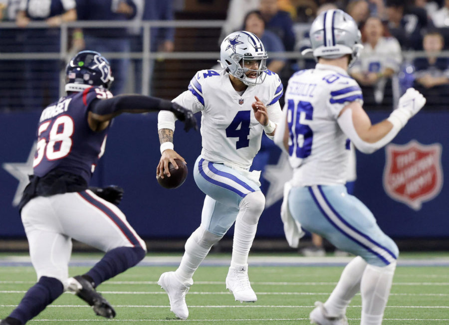 Dallas+Cowboys+quarterback+Dak+Prescott+%284%29+keeps+the+ball+and+looks+to+get+a+first+down+against+the+Houston+Texans+during+the+third+quarter+at+AT%26amp%3BT+Stadium+on+Dec.+11%2C+2022%2C+in+Arlington%2C+Texas.+%28Tom+Fox%2FThe+Dallas+Morning+News%2FTNS%29