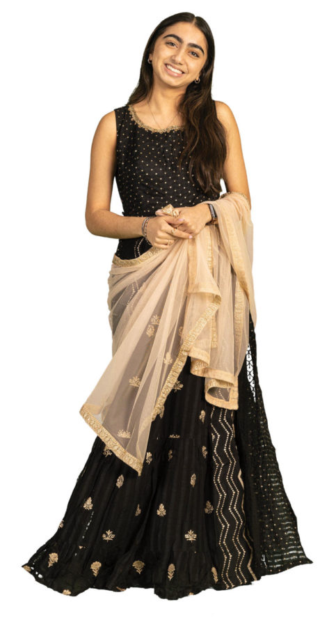 Trisha Patel wears a traditional dress and shawl worn by women in India.