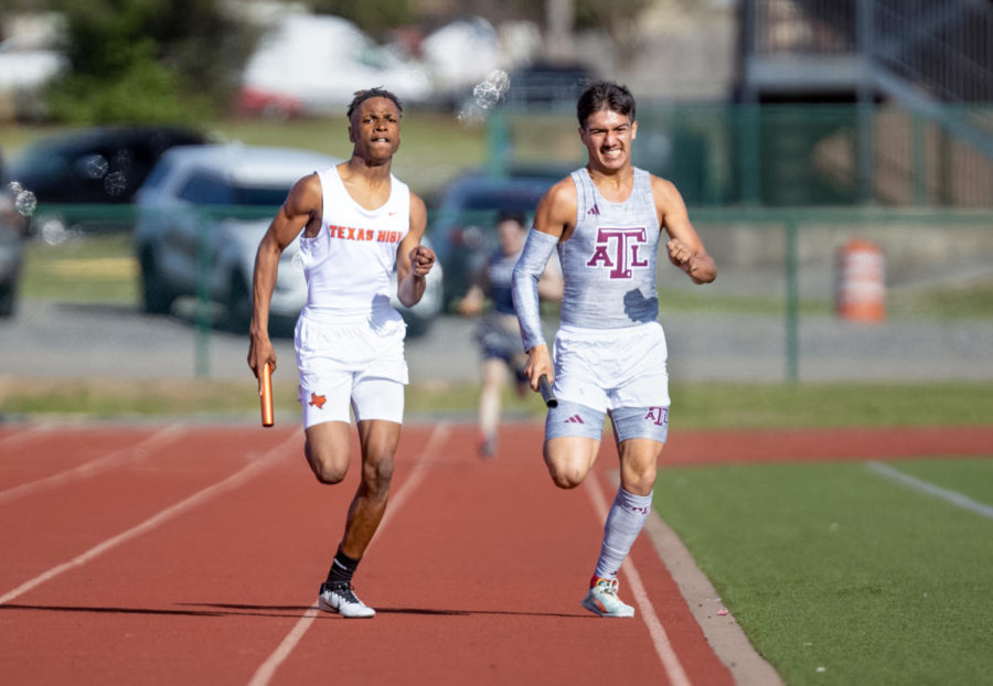 Sophomore Karnell Jolly races to the finish line in the 1600 meter relay. The 4x4 won the Watty Myers meet, advancing the team to the Clyde Littlefield Texas Relays.