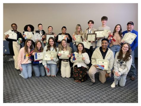 Texas High Photo Club members hold their awards at the ATPI Conference Award Ceremony. Students competed in different categories such as Picture Package, Environmental Self Portrait, Cropped Competition and more.