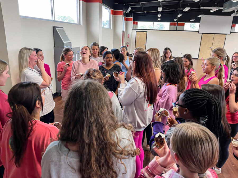 HighStepper director Amber Reynolds is surrounded by Highsteppers as they learn the gender of her baby. All of the dancers were thriller to learn of her expected girl.