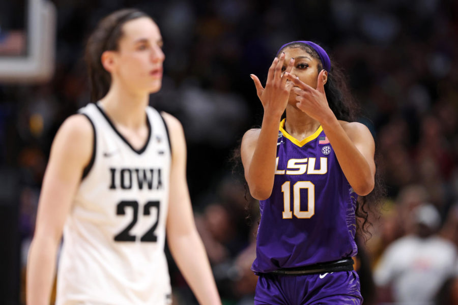 Angel Reese (10) of the LSU Lady Tigers reacts toward Caitlin Clark (22) of the Iowa Hawkeyes during the fourth quarter of the 2023 NCAA Womens Basketball Tournament championship game at American Airlines Center on Sunday, April 2, 2023, in Dallas. (Maddie Meyer/Getty Images/TNS)