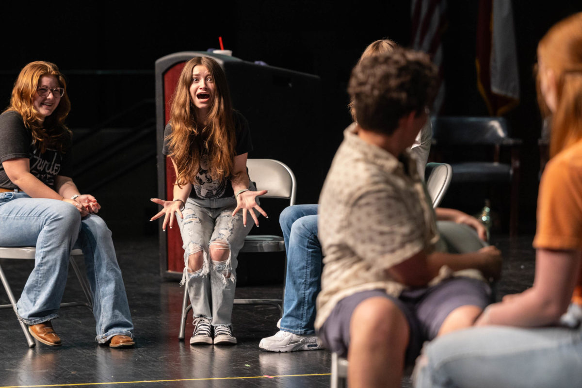 Senior+Riley+White+performs+a+skit+at+the+annual+Howdy+Camp+hosted+by+the+Tiger+Theater+Company+on+Aug.+18%2C+2023.+Theater+showcases+their+program+to+new+members+giving+them+an+opportunity+to+get+to+know+each+other+before+the+season+starts.+