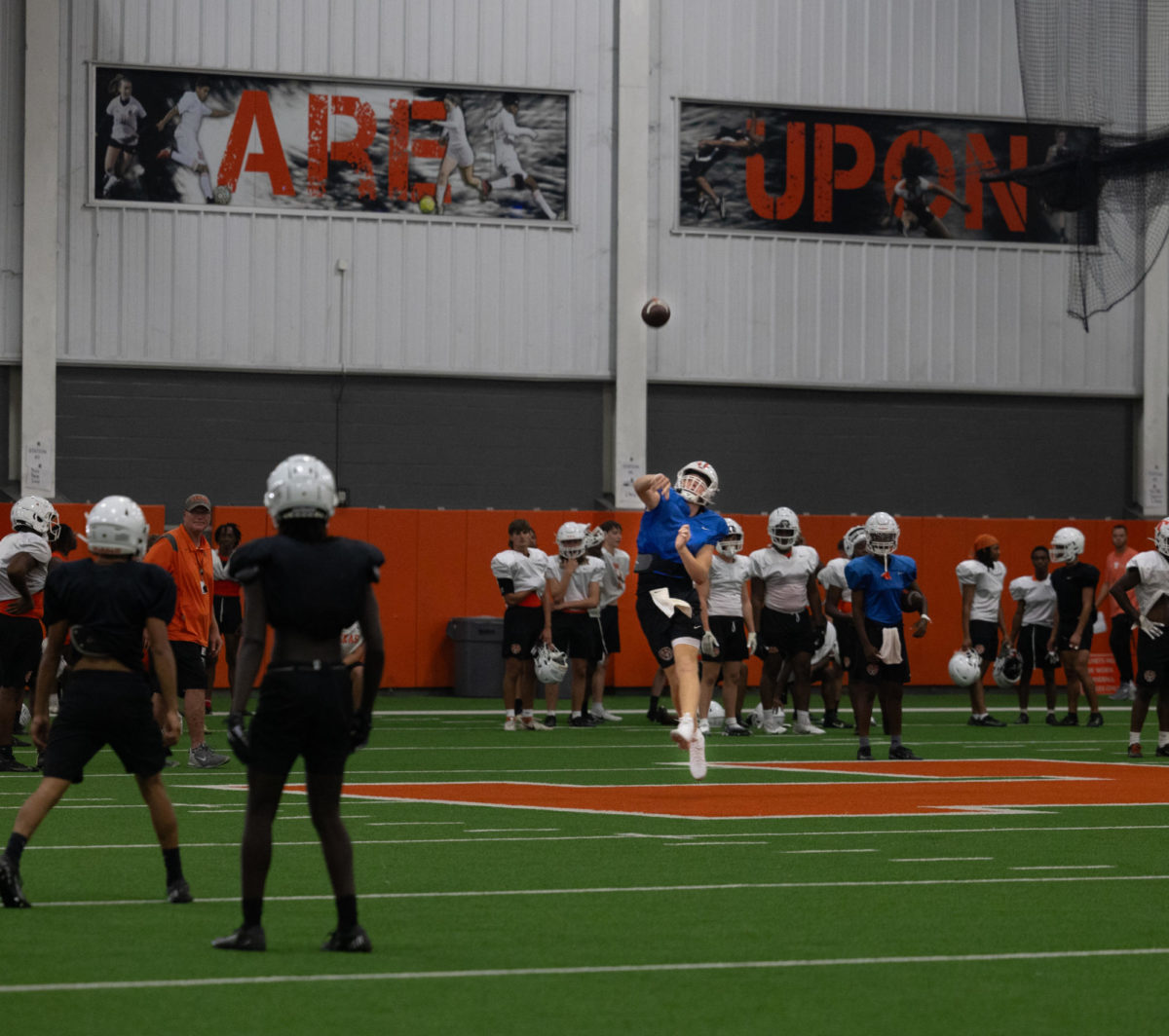 Junior quarterback David Potter launches a ball during their first practice of the week. The Tigers will take on the state ranked Rangers of Lone Star in their season opener Thursday, Aug 24, 2023.