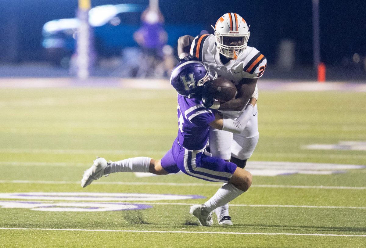 Senior tightens Joseph Miller is runs the ball in a district game against the Hallsville Bobcats Friday, Sept. 22, 2023. The Tiger offense proved productive, putting up thirty points in the victory over Hallsville. 