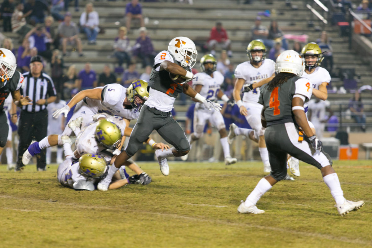 Hampton runs through a Hallsville defense in a game during his senior year. To this day, Hampton still holds records he set in place during his time here as a Tiger.