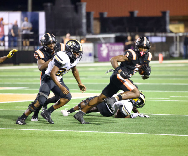 Sophomore running back Tradarian Ball escapes defender in Homecoming game against Mount Pleasant Friday, Sept. 29, 2023. The Tigers brought home the win with a final score of 58-29, moving their district record to 2-0.