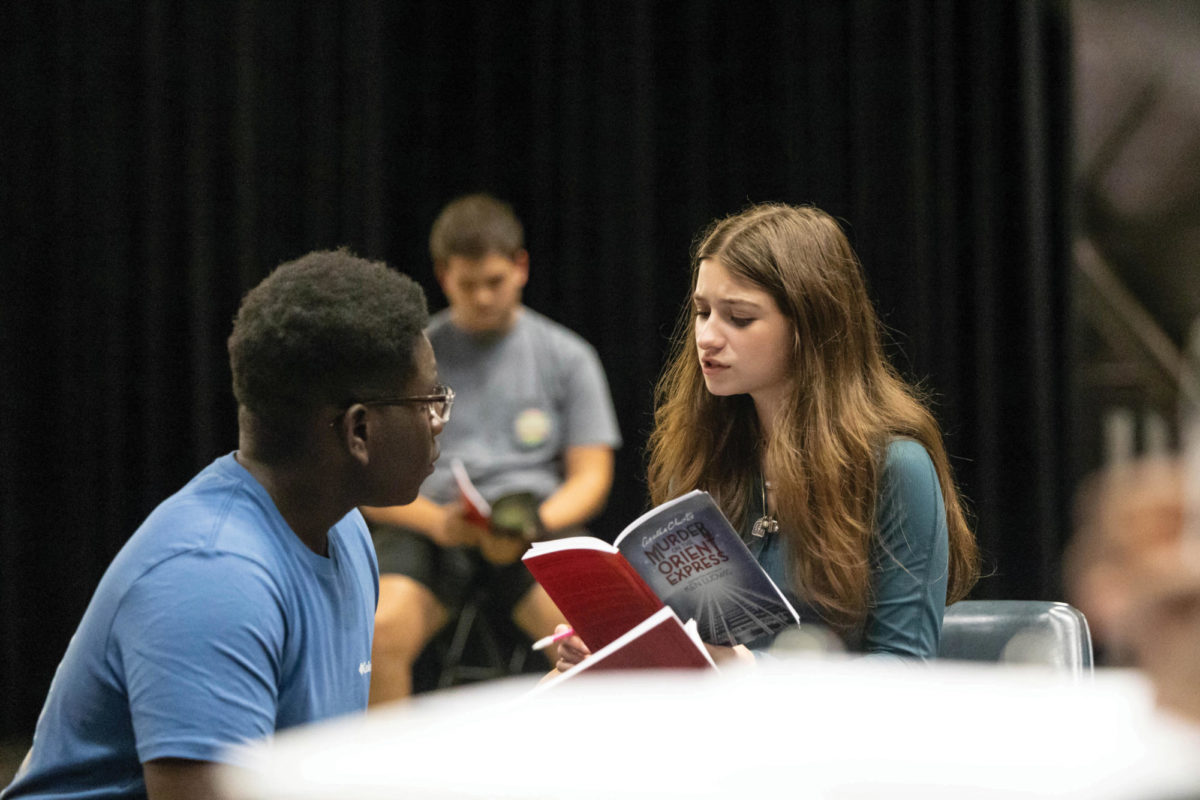 Book in her hand, senior Riley White reads her lines in rehersal on Aug. 29, 2023. The Texas High Tiger Theatre company will perform on October 5th and 6th at 7p.m., and October 8th at 2p.m. And 7p.m. Tickets for adults are $10, and $5 for students. 