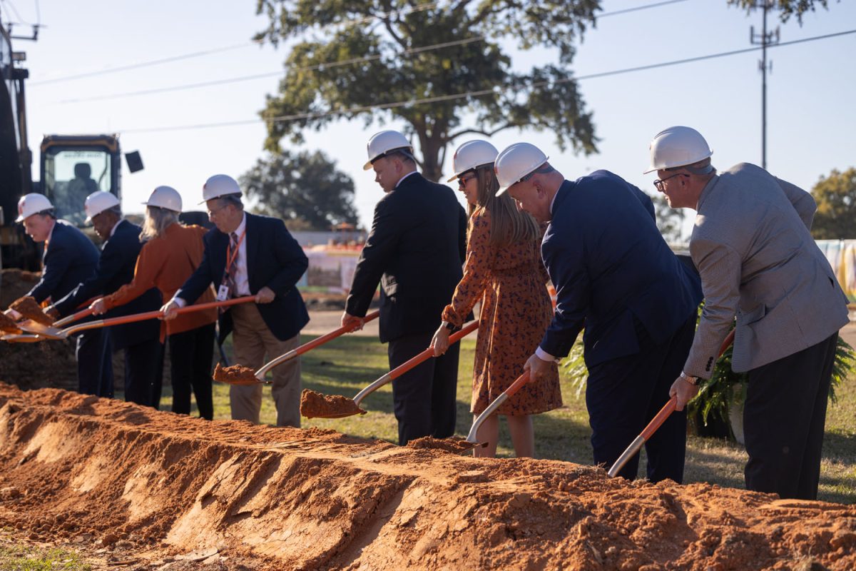 Administrators and board members shovel dirt at the groundbreaking ceremony ceremony for Parks Elementary School. The new location will serve as the replacement campus for Spring Lake Park and Highland Park Elementaries. Members of the community gathered at the old Pine Street campus to kick off the construction process on Oct. 19, 2023.