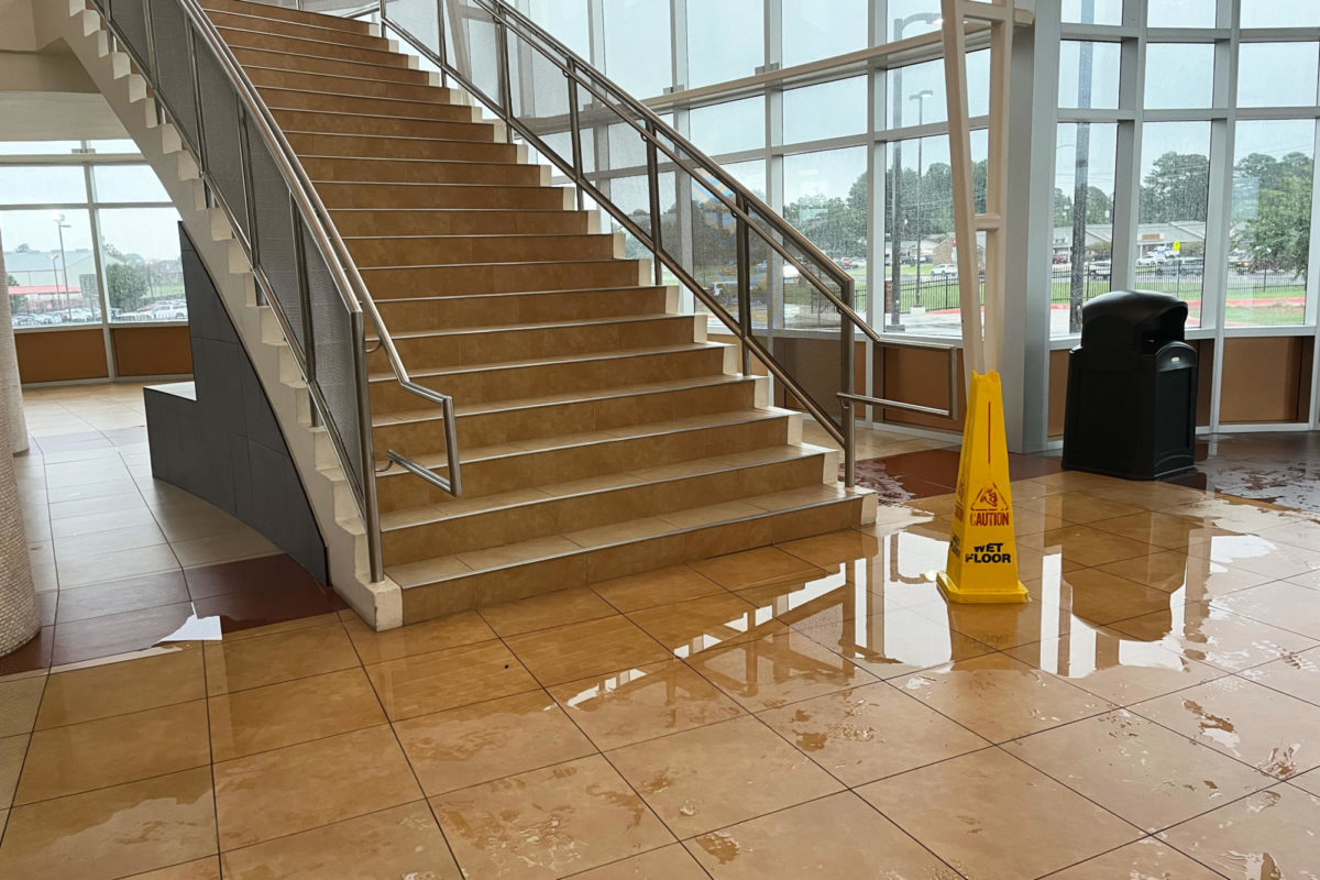 The foyer of the Sullivan Performing Arts Center floods after heavy rains. Maintenance is working to repair the leak as quickly as possible.