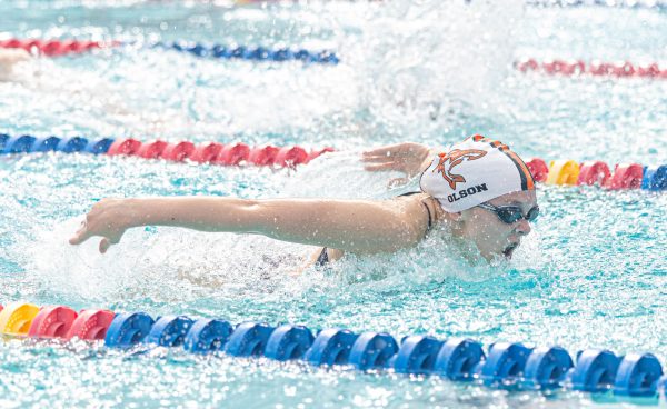 Pulling herself through the water, Sophomore Maya Olson comes up for a gasp of air. The Tigersharks competed against other schools in the district at the Tyler Tri swim meet on October 28, 2023.