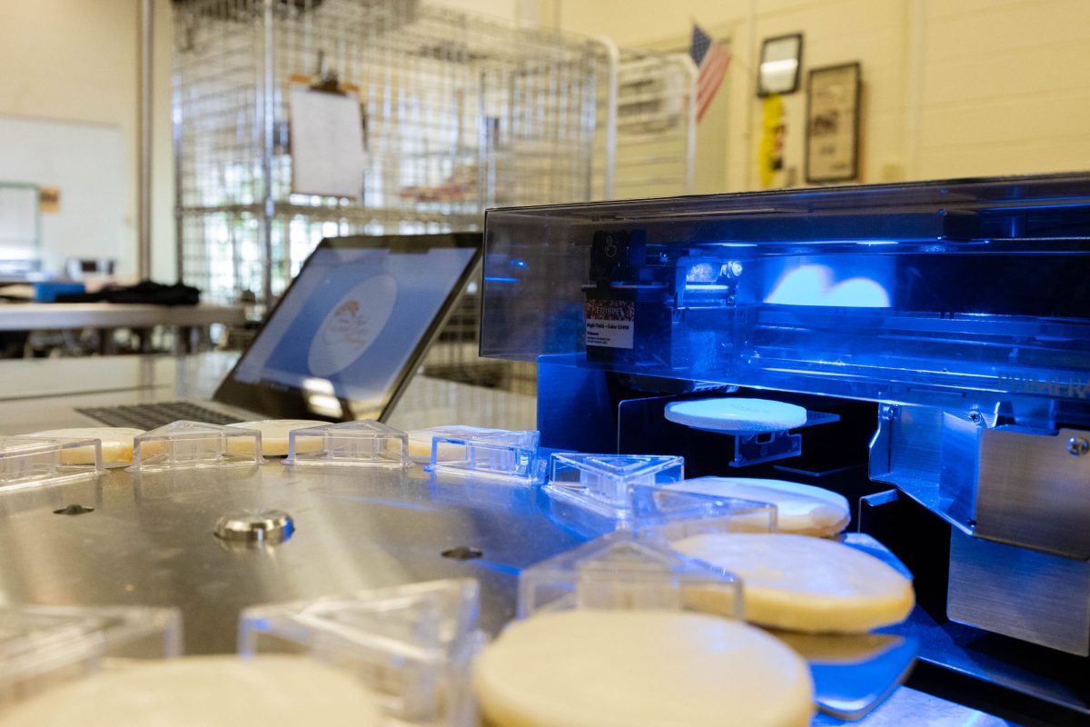 Texas High Schools culinary cookie printer designs a cookie on Nov. 14, 2023. Culinary recently purchased the printer.