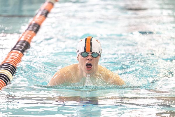 Sophomore Coy Ward emerges from the water for a breath of air during his event. The Tigersharks competed against Newman Smith and Ranchview on October 21, 2023.