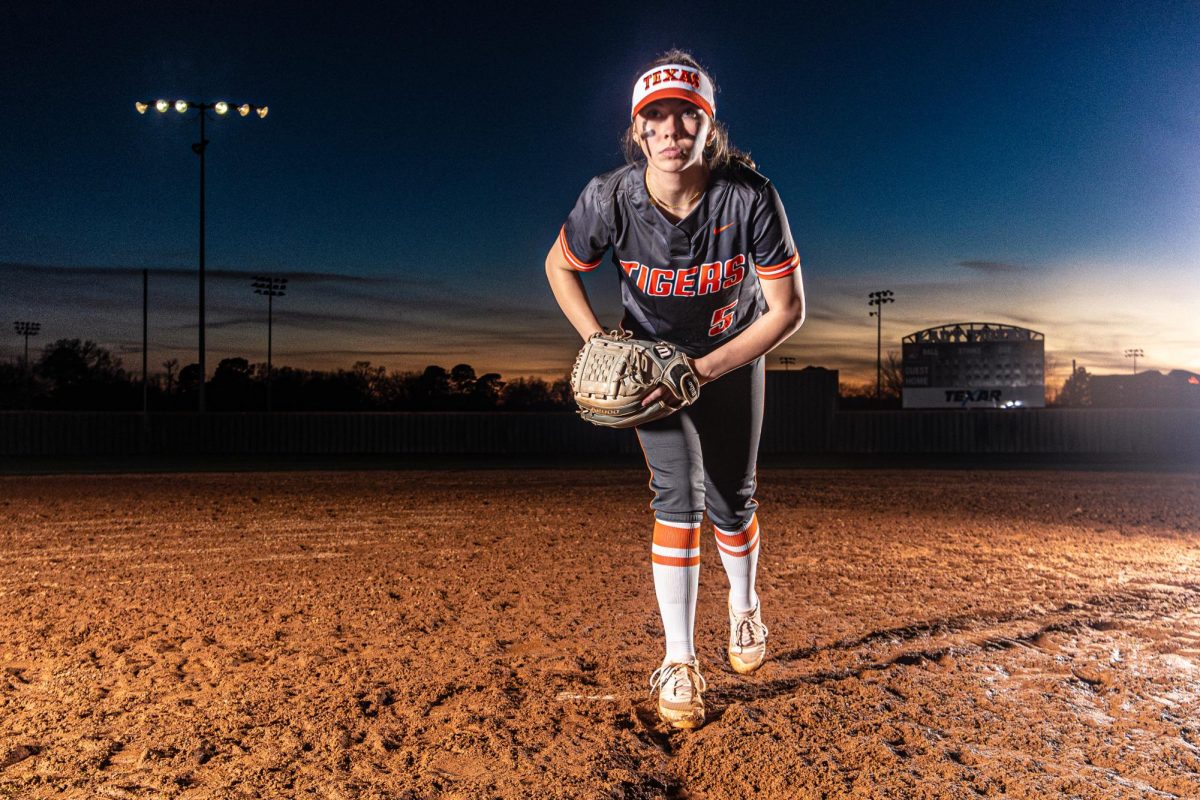 Senior utility player Mollie Fisher stands on the mound ready to deliver a pitch at Tiger Park Jan. 31, 2023. The Tigers are kicking off their start to pre-season play Tuesday, Feb. 13, 2023.