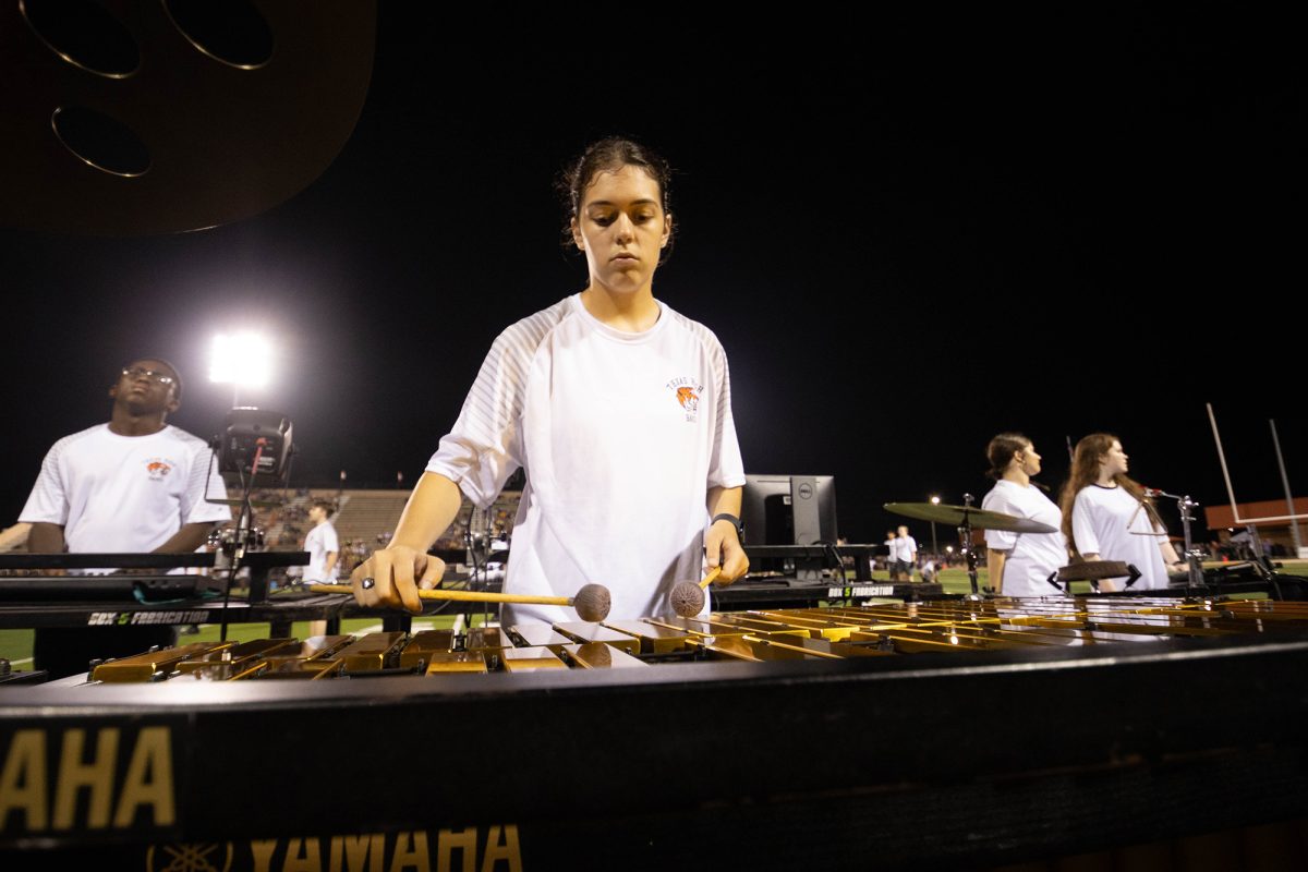 Senior Lourdes Quijas looks forlornly at the vibraphone as she plays her last run of Liquid gold. 