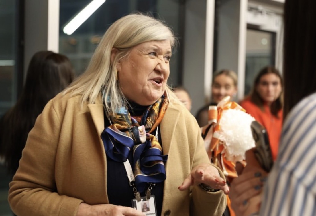 Texas High teacher Susan Waldrep speaks with parents and prospective students during the annual Experience THS event. The event itself featured many booths, including those of classes and clubs such as engineering, publications, BPA, student council and other Dual Credit programs.