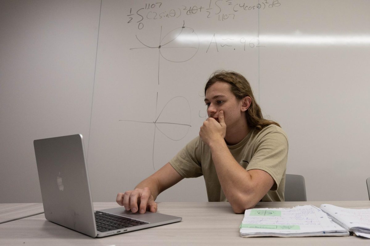 Senior Sam Cross works diligently on classwork and future aspirations. Cross will attend the Domtar Internship in the summer of 2026.