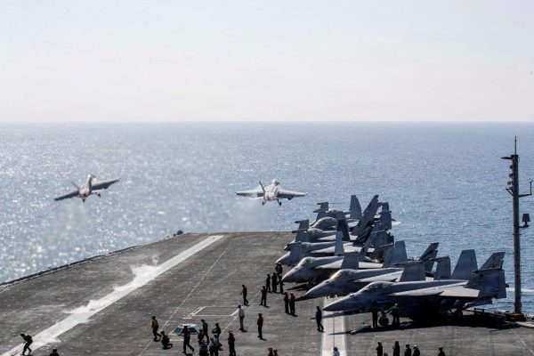 Two F/A-18 Super Hornets launch from the flight deck of the U.S. Navy Nimitz-class aircraft carrier USS Abraham Lincoln in support of the Operation Epic Fury attack on Iran from an undisclosed location March 3, 2026. U.S. Navy/Handout via REUTERS