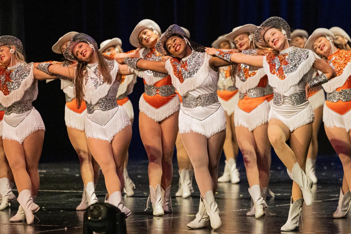 In the last dance of the night and their last dance as Texas HighSteppers, seniors Nyreah Chatman and Meredith McPhaul perform to "America" by Neil Diamond. The HighSteppers held their annual spring show on Apr. 24-25, 2026, at the Sullivan Performing Arts Center on the THS campus.